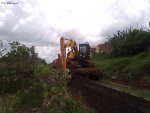 Maintenance team reopening drainage channels